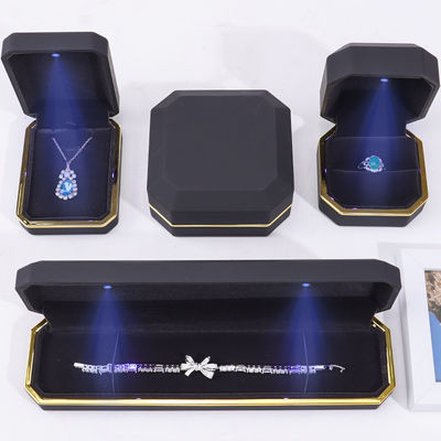 OEM ODM High-End handgefertigte schwarze achteckige LED-Schmuckschatulle mit Velveteinsatz