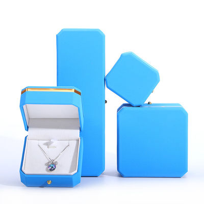 Blaue PU-Leder-Geschenkverpackung Schmuckschachtel für Hanhong achtseckiges Metallknopf Custom Logo