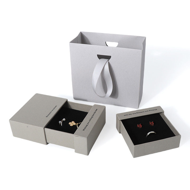 China Herstellung Großhandel hochwertige Halskette Ohrring Armband Ring Box Schmuck Verpackung Personalisierte Benutzerdefinierte Umweltfreundliche Karton Papier grau Schublade Schmuckschatulle mit Logo